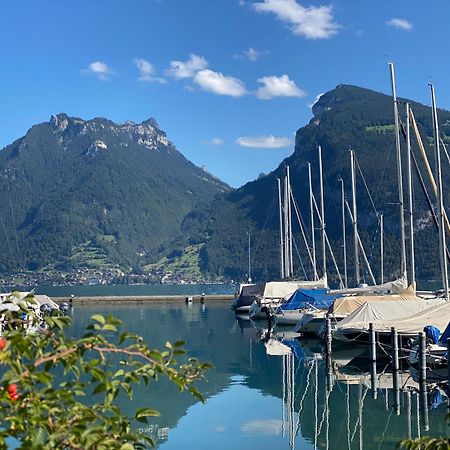 Herrlicher Blick auf Berge und See Faulensee Exterior foto